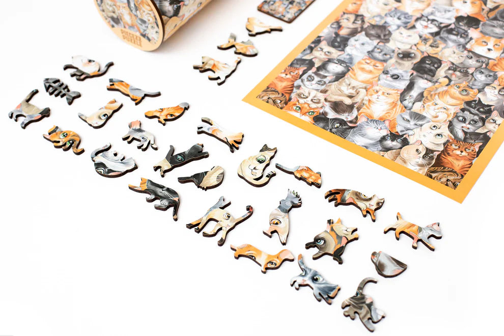 Get ready for a feline fiesta with our Cat Party Piecezz Wooden Puzzle. This charming wooden puzzle invites both kids and adults to join a whimsical gathering of cats, offering hours of delightful and entertaining play. Explore the details of this remarkable and cat-inspired puzzle that promises to bring joy and laughter to cat lovers of all ages.