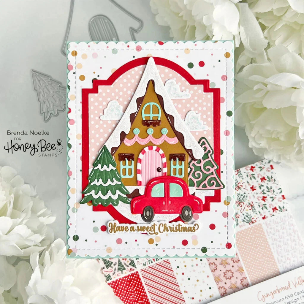 Give your cards and paper crafts a delightful boost with our exclusive 6" x 8.5" cardstock pad! Filled with charming gingerbread designs, festive Christmas candy, and classic holiday patterns, this pad includes 24 double-sided sheets featuring coordinating prints. Printed on smooth satin finish 65# cover cardstock for a rich, luxurious feel. Acid- and lignin-free to ensure lasting quality. Made with love in the USA!