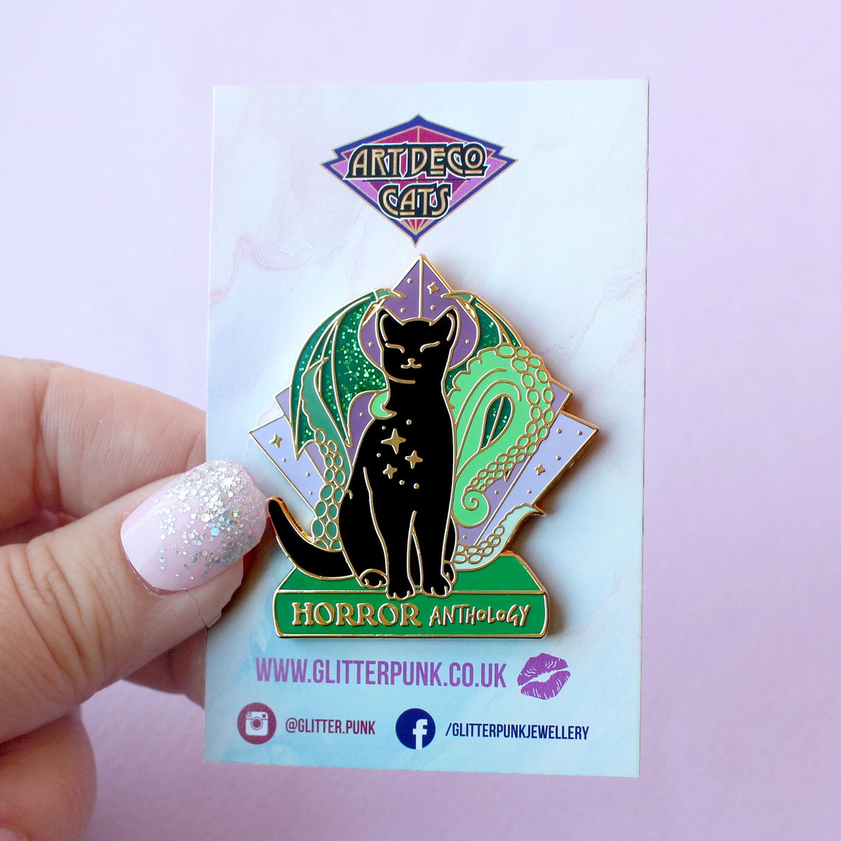 Horror Anthology Enamel Pin; Art Deco Black Cat dark academia literary book cat pin
The 1920s is an iconic time for horror, and this creepy but cute Horror Anthology cat is the perfect way to show off your love for the genre!
It features a black cat perched on a green book with wings and tentacles from indescribable creatures from the deep.