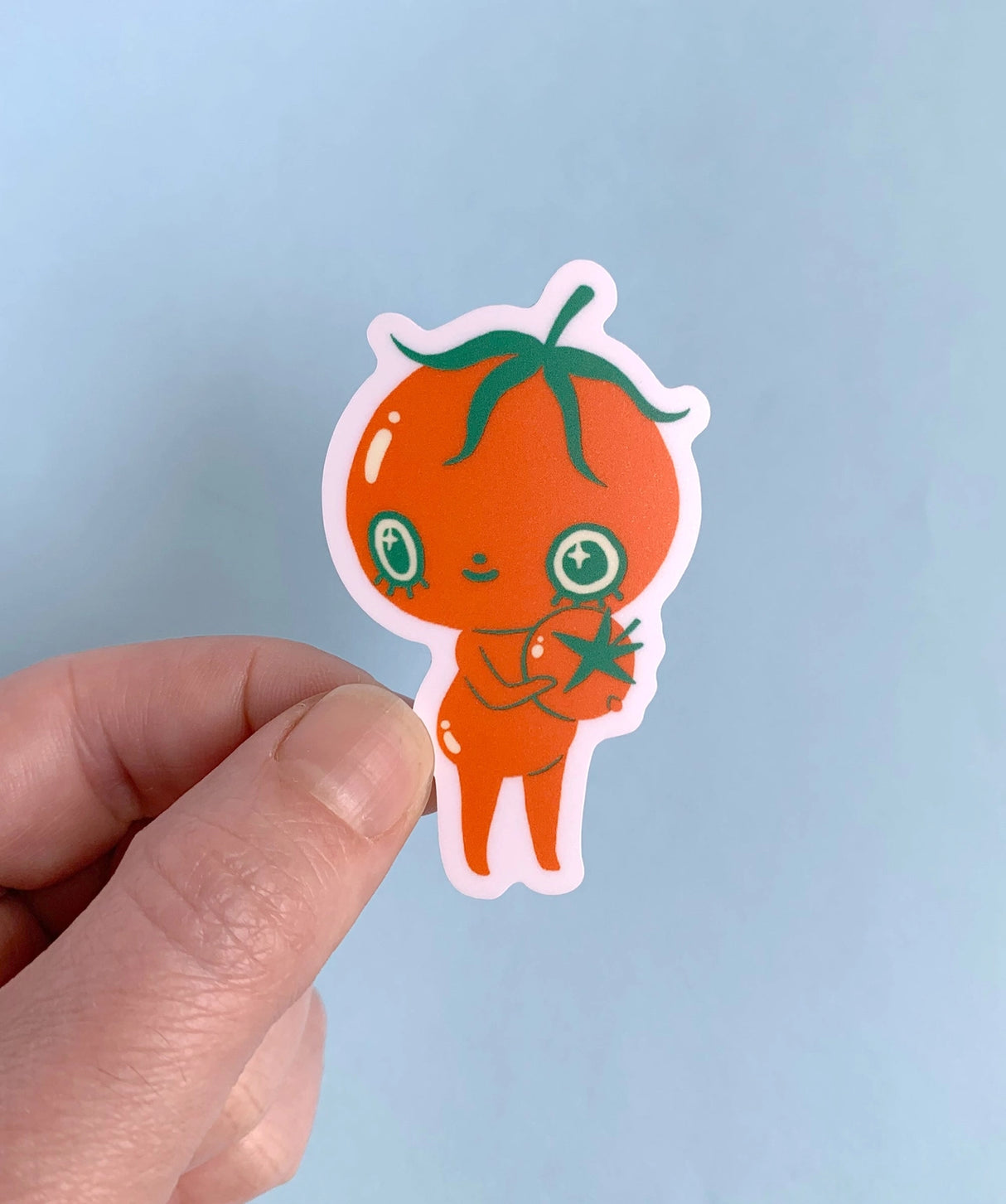 "Baby Tomato" Vinyl Sticker made from Hannakin illustration.
Made from a durable waterproof vinyl with a matte laminate that protects it from scratching, rain and sunlight.
Sticker measures 40mm x 60mm