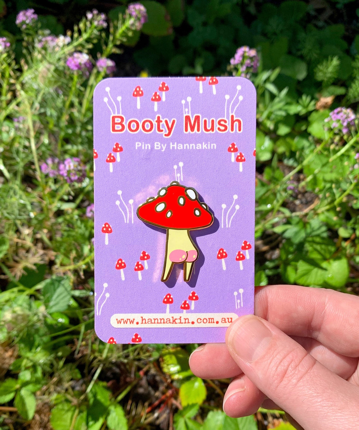 Booty Mush enamel Pin measures 2.6 x 3.5cm, made from red, cream and white hard enamel with shiny gold metal finish and pink screen-printed rosy bum cheek details.
This pin is held in place with secure rubber backing. Comes on a 100% post-consumer recycled backing card.
Designed in Melbourne by Hannakin.