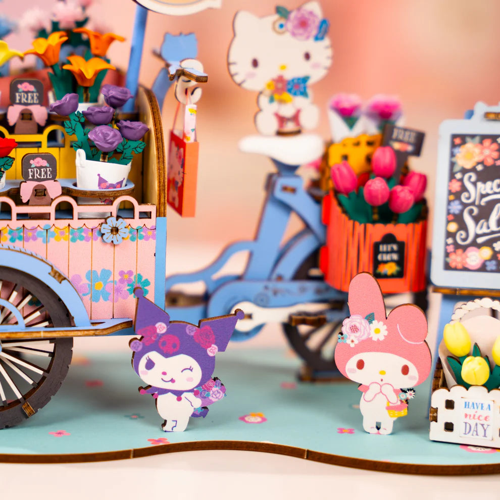 Unleash your creativity with this charming DIY 3D wooden puzzle featuring Hello Kitty and her adorable friends! This fun and engaging kit lets you build a beautiful flower cart filled with vibrant, colorful flowers. Perfect for fans of Hello Kitty, the puzzle includes Hello Kitty, Kuromi, My Melody, and Cinnamoroll, each adding their own unique charm to the scene.