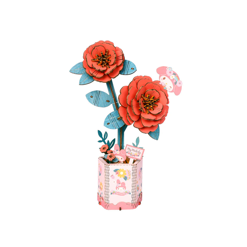 This 3D Wooden Puzzle Kit from Hands Craft lets your creativity bloom as you build a beautiful red camellia flower featuring the beloved My Melody character from Hello Kitty and Friends. Made from high-quality natural wood, the pieces fit together precisely, offering a fun and rewarding challenge for both adults and kids.