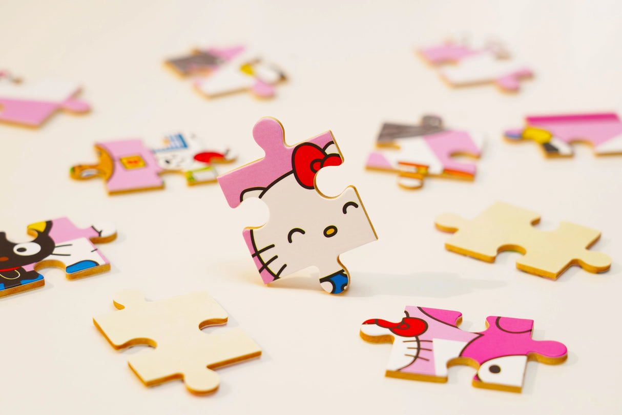 Discover joy with the Hello Kitty Wooden Jigsaw Puzzle: Street with Shops (94pcs). This officially licensed Sanrio product features iconic Hello Kitty in 94 vibrant wooden pieces. Crafted for durability and a seamless fit, it's a delightful challenge for fans of all ages 8+. Embrace positivity and bring Hello Kitty to life with this charming puzzle – perfect for relaxation and family fun. Display your completed masterpiece proudly and celebrate the timeless appeal of Hello Kitty.