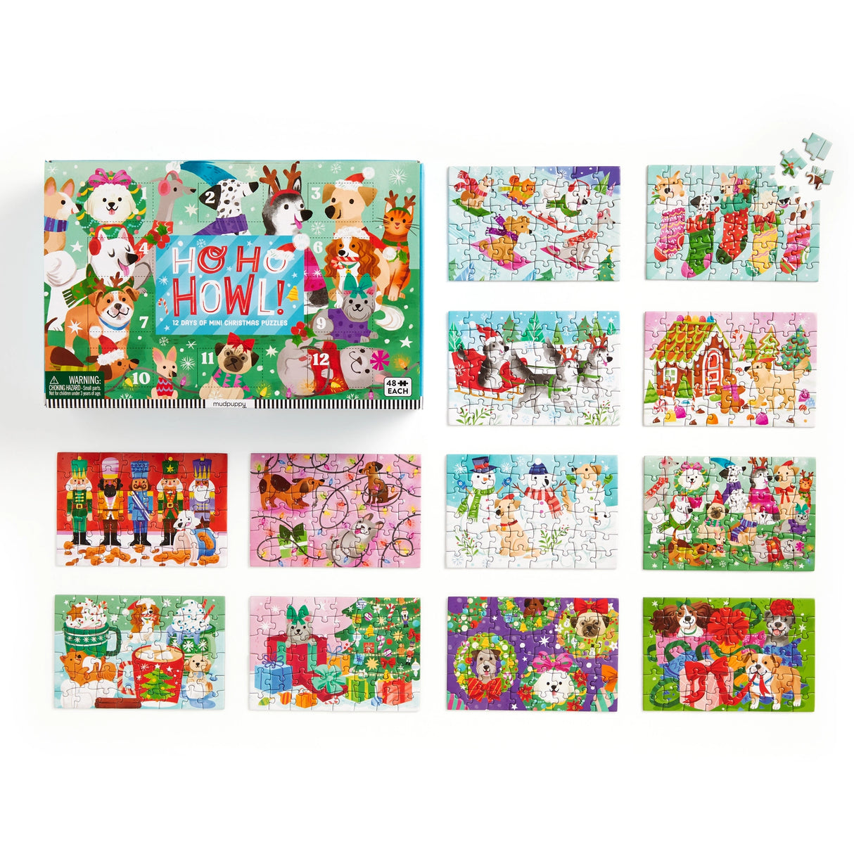 COUNTDOWN PUZZLE – Countdown the 12 days of Christmas with our Ho Ho Howl Countdown Puzzle Set. Open the cover flap to find 12 perforated windows, each with a 48-piece mini puzzle inside. A double-sided insert provides an image reference for each mini puzzle.
BRIGHT AND BOLD ARTWORK – This Ho Ho Howl Countdown Puzzle features the cutest dogs partaking in Christmas customs like sledding, building a gingerbread house and of course drinking hot chocolate!