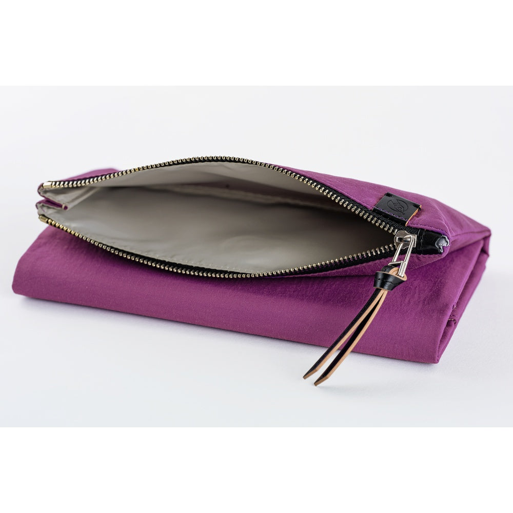 The zippered pocket features a gusset for roomy storage.