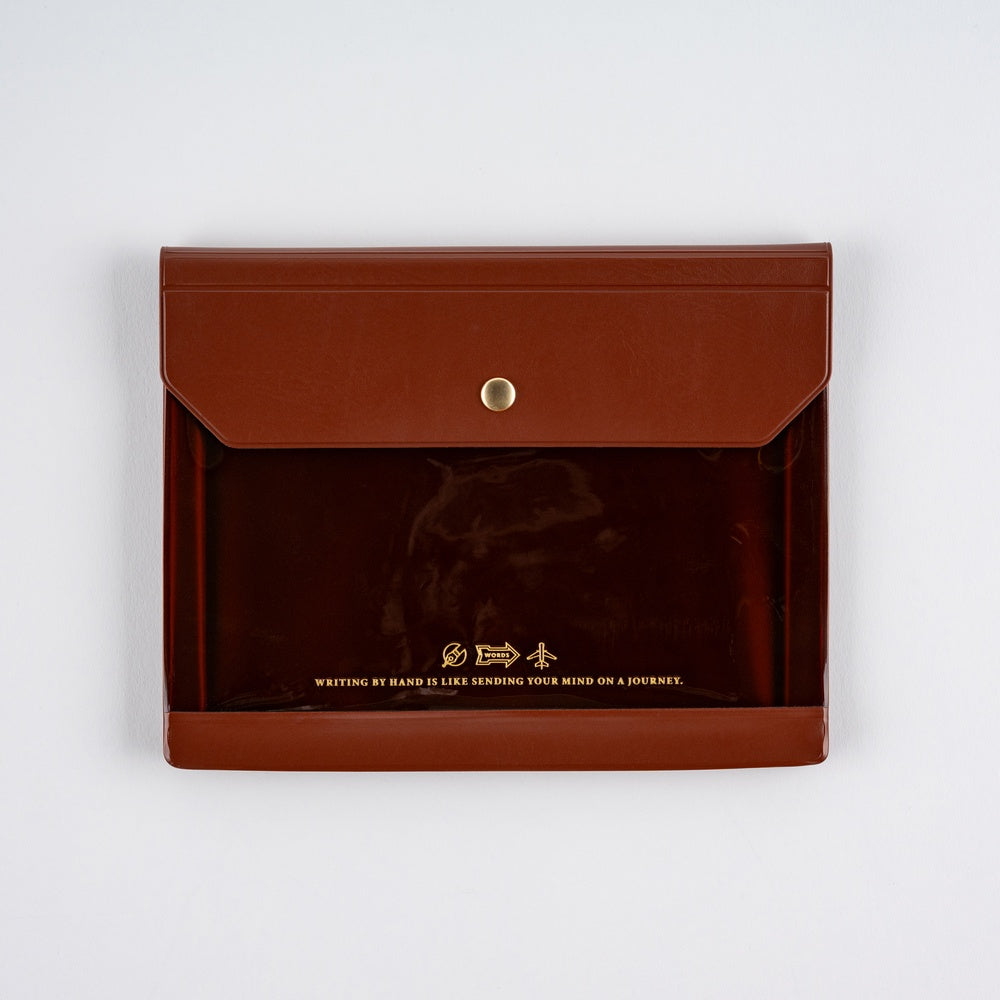 Hobonichi Alettone: Document Case for A6 Size Brown leather envelope with gold accents on a white background