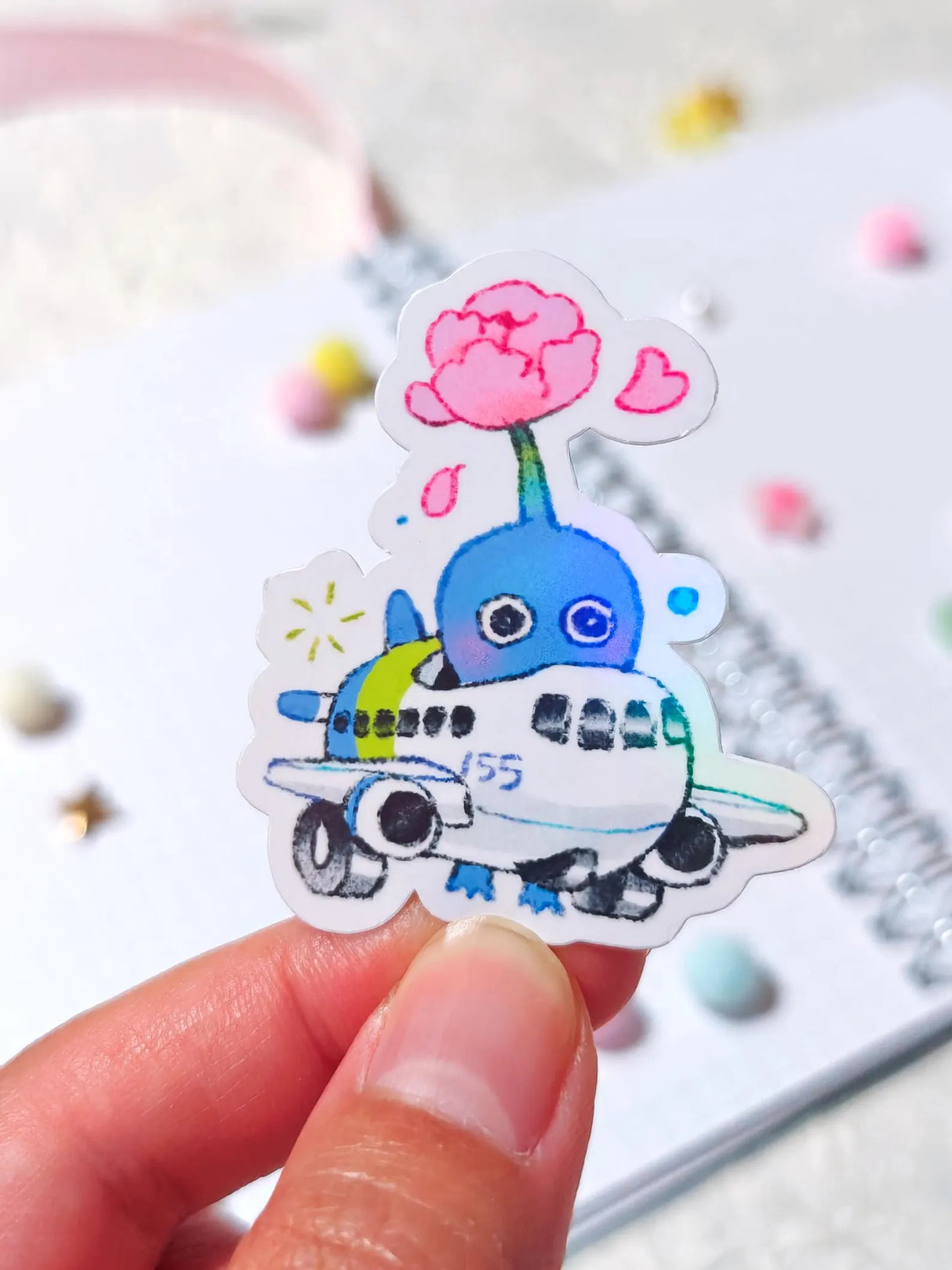 This is a glossy vinyl die-cut paper sticker, illustrated and made in-house by me. It's waterproof and ideal for decorating hard surfaces like laptops, water bottles, and phone cases, adding a cute touch to your belongings.
Material: premium glossy waterproof vinyl