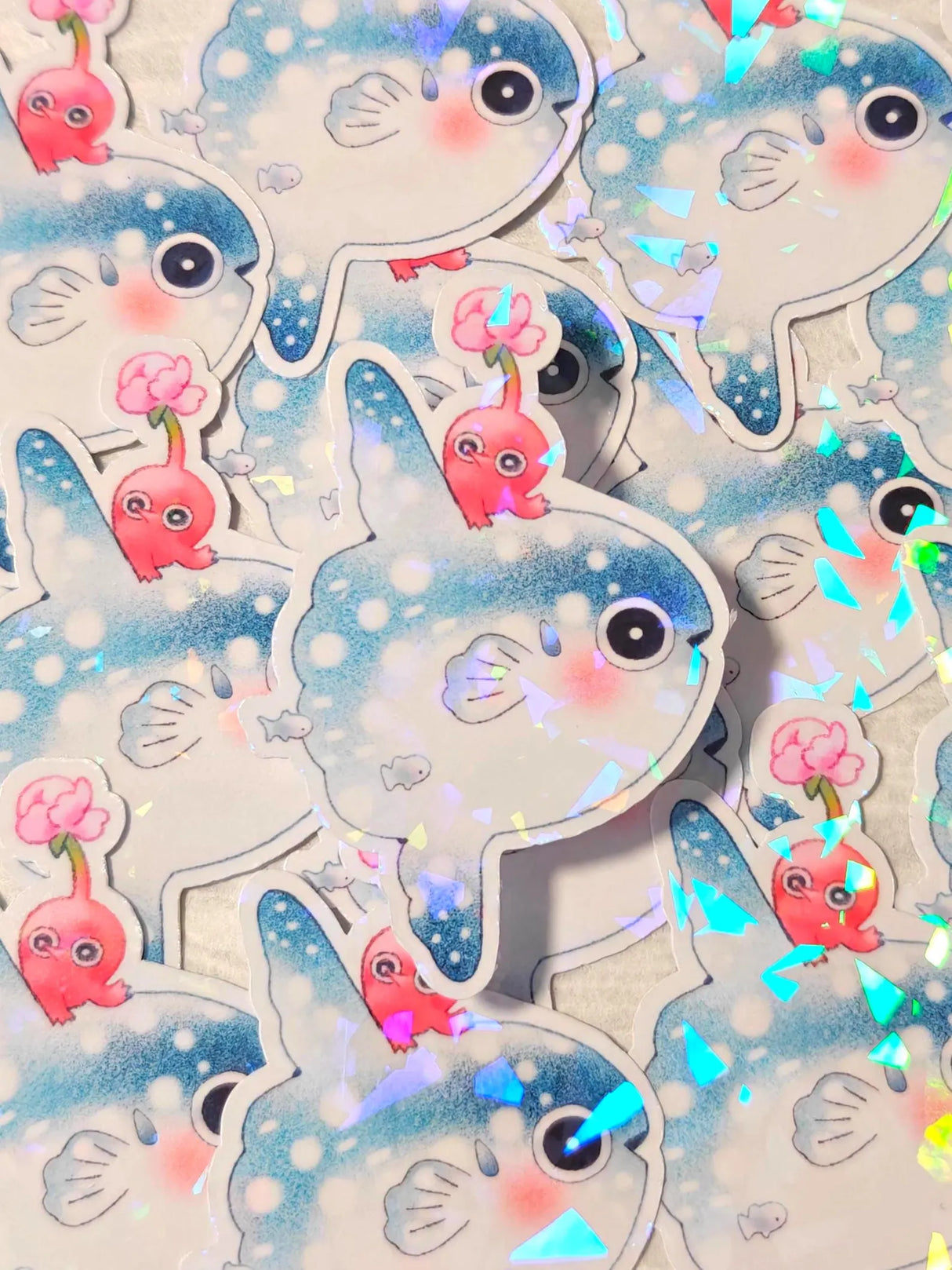 This is a glossy vinyl die-cut paper sticker with holographic features, illustrated and made in-house by me. It's waterproof and ideal for decorating hard surfaces like laptops, water bottles, and phone cases, adding a cute touch to your belongings.
Material: premium glossy waterproof vinyl