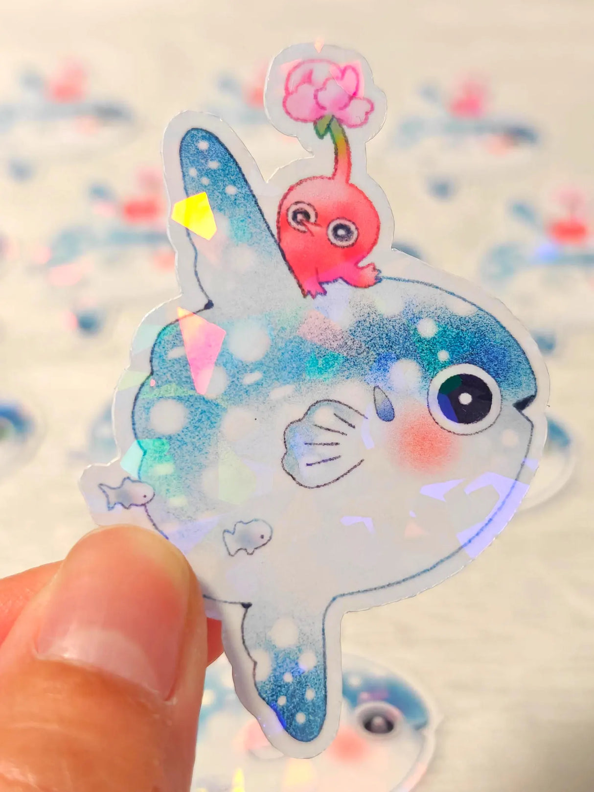 This is a glossy vinyl die-cut paper sticker with holographic features, illustrated and made in-house by me. It's waterproof and ideal for decorating hard surfaces like laptops, water bottles, and phone cases, adding a cute touch to your belongings.
Material: premium glossy waterproof vinyl