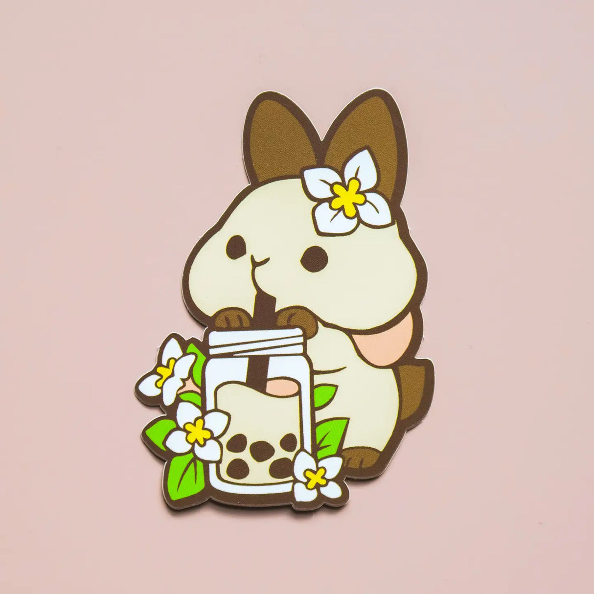 Cartoon character with a bubble tea and flowers on a pink background