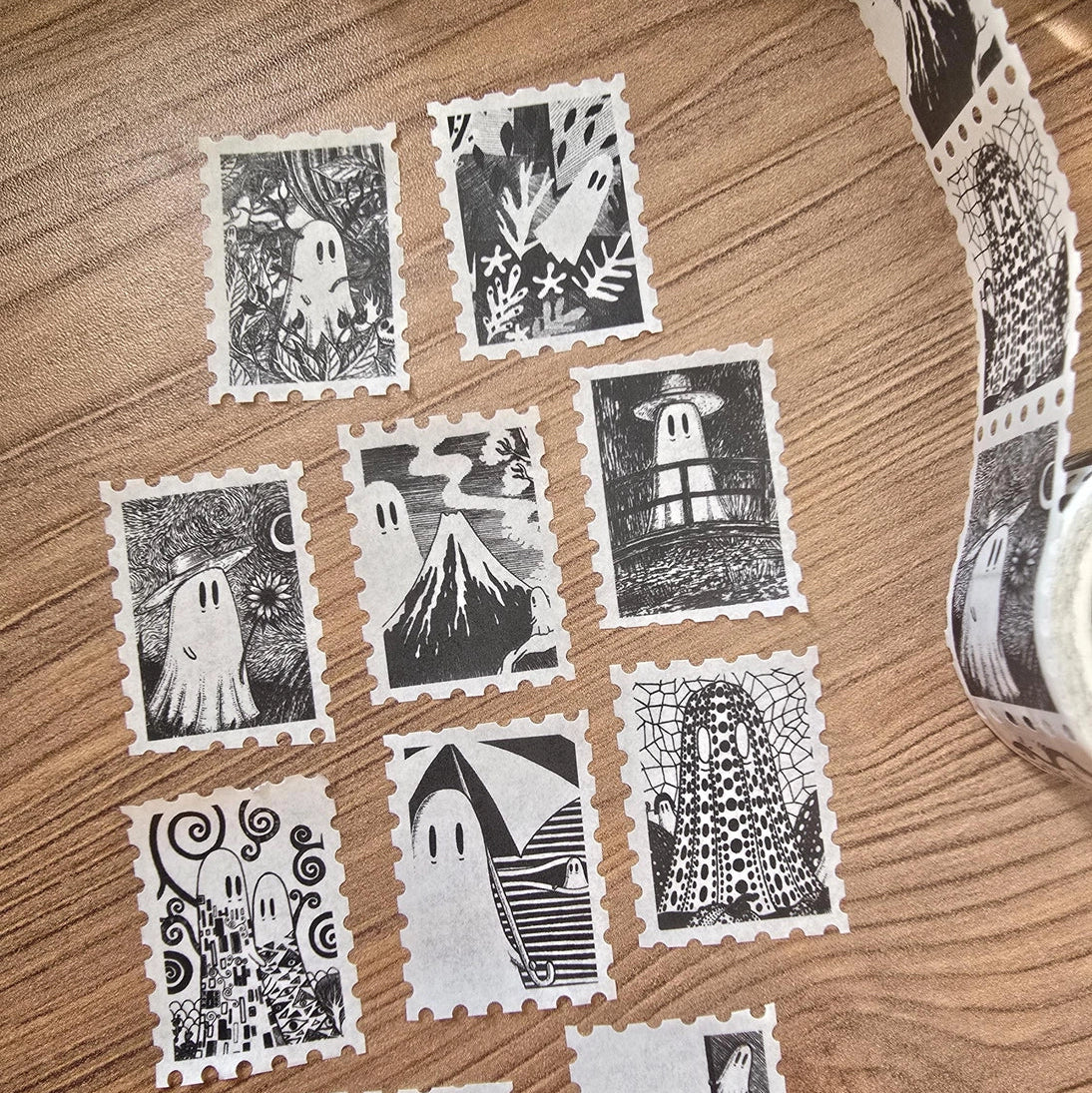 One of two tapes from the Creative Spirits series by Jon Turner, little ghosties taking you on an eclectic tour of art history. This roll features ghosts inspired by Vincent Van Gogh, Frida Kahlo, Piet Mondrian, Claude Monet, Henri Matisse, Hokusai, Malika Favre, Gustav Klimt, Keith Haring, and Yayoi Kusama.
Perforated to look like a roll of postage stamps, this washi tape features a repeating pattern of ten designs in portrait format from hand-drawn pen and ink artwork, recreated in incredible detail at m