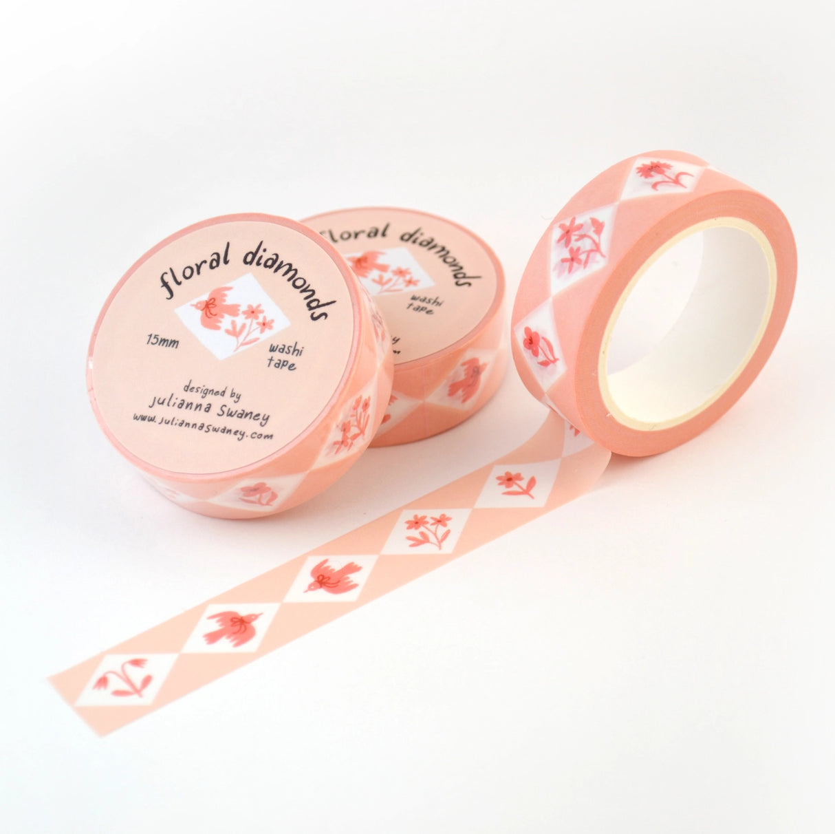 This delightful washi tape features a design of diamonds inset with different flowers and charming flying birds with bows