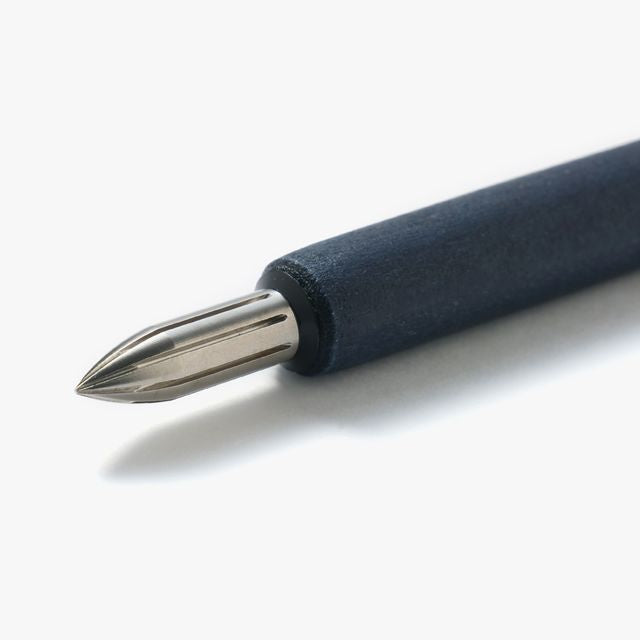 The stainless steel nib was born from a desire for a durable and practical dip pen nib. Enjoy a variety of line widths from fine to broad by tilting the nib at different angles. Fits most nib holders as well as those from our range.
The nib was designed by Yuto Yamazaki of Kuramae-based design studio Alloy. The nib tip has been rounded and polished with meticulous care, providing a remarkably smooth writing experience that defies expectation. Perfected over many iterations, the innovative nib is like no ot