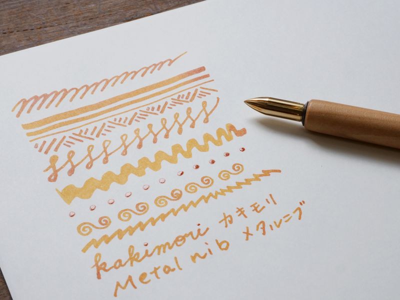 The brass nib was born from a desire for a durable and practical dip pen nib. Enjoy a variety of line widths from fine to broad by tilting the nib at different angles. Fits most nib holders as well as those from our range.
The nib was designed by Yuto Yamazaki of Kuramae-based design studio Alloy. The nib tip has been rounded and polished with meticulous care, providing a remarkably smooth writing experience that defies expectation. Perfected over many iterations, the innovative nib is like no other.