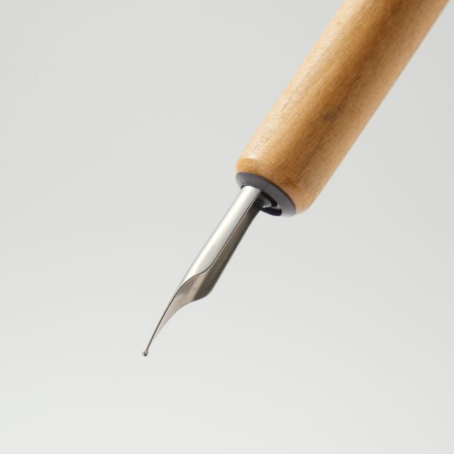 Enjoy the smooth writing feel of a fountain pen in a maintenance-free nib. When you’re done writing, simply rinse with water and dry. An ideal first nib for those new to bottled ink.
The nib is carefully aligned by hand to achieve superior ink retention, allowing about a sentence of writing with each dip. Developed specially for writing, the design replicates the form of the fountain pen nib, while rigorous testing ensures the nib won't catch on paper.
Stainless steel, iridium (nib point)
Use and Care: