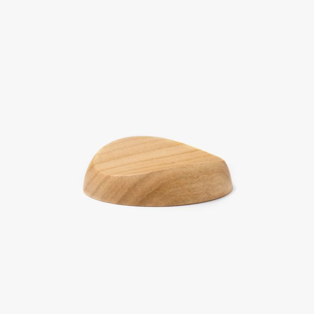 A pen rest that enhances the moments between writing. Designed to hold any pen without the need for precise placement, it blends effortlessly into your desk space with a subtle but assured presence. Enjoy the rich texture and wood grain of Japanese cherry.
Designed for stability to ensure your pens and surfaces are protected from accidental movement or damage. The pen rest comfortably holds two to three slender pens.
Use and Care:
To prevent distortion and discolouration, avoid soaking in water, sudden t