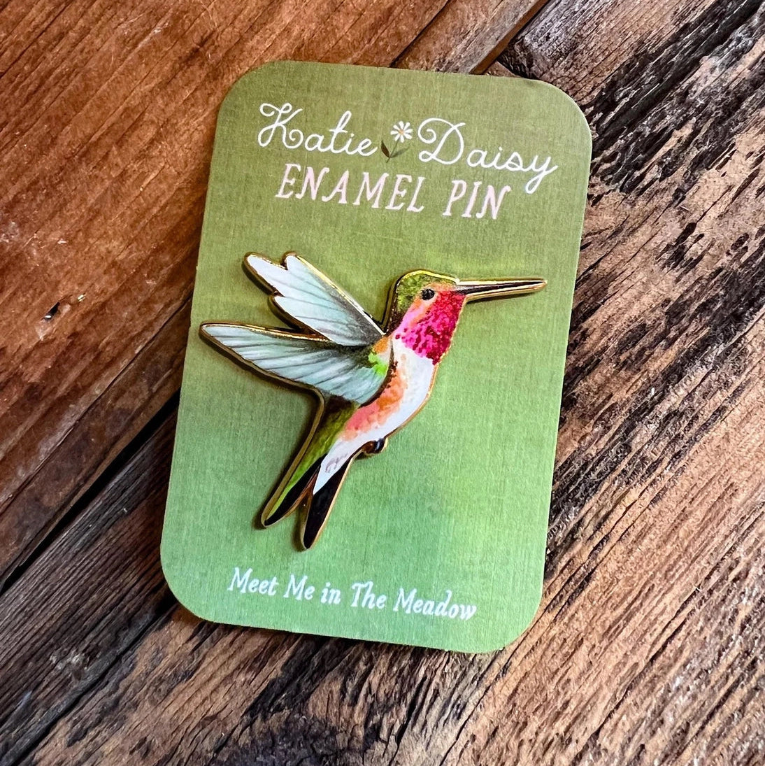 Hummingbird Enamel Pin by Katie Daisy
A tiny treasure to pin on your jacket, tote, or favorite old flannel—each one a little love letter to country delights, small joys, and the art of noticing.