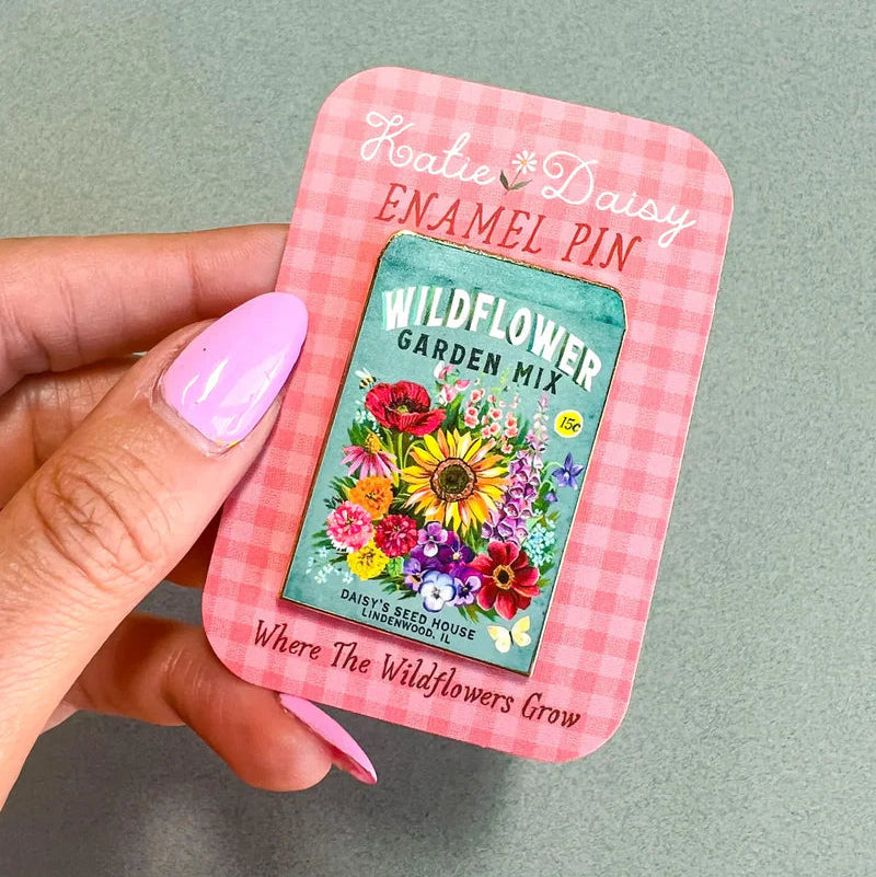 Seed Packet Enamel Pin by Katie Daisy
A tiny treasure to pin on your jacket, tote, or favorite old flannel—each one a little love letter to country delights, small joys, and the art of noticing.
