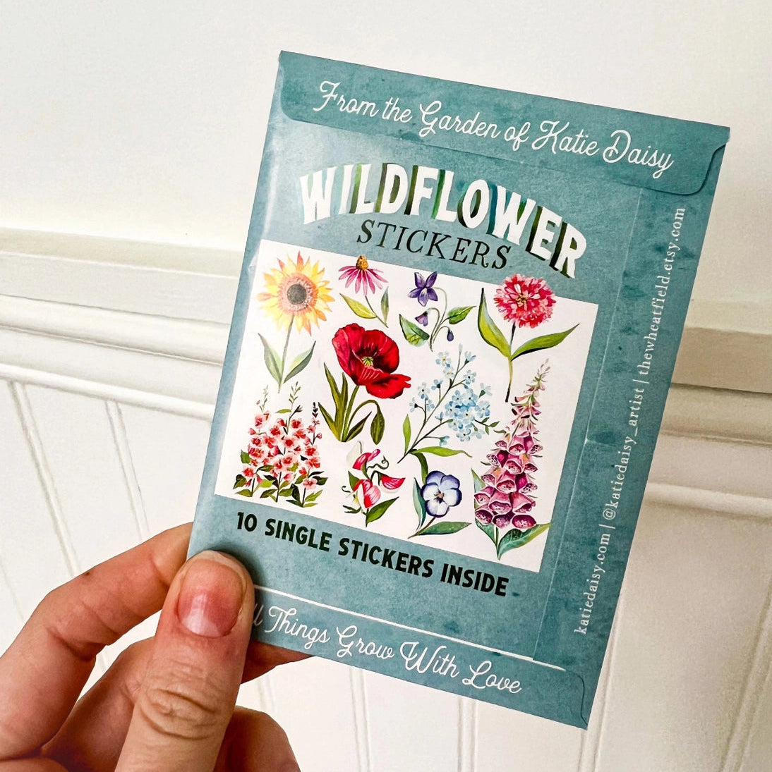 Wildflower Sticker Pack - Set of 10 Matte Stickers by Katie Daisy
From The Garden of Katie Daisy:
Adorn your laptop, water bottle, packages and so much more with this set of vibrant wildflower STICKERS!! You'll receive 10 floral stickers in a seed packet! (This listing is not for wildflower seeds ;) )