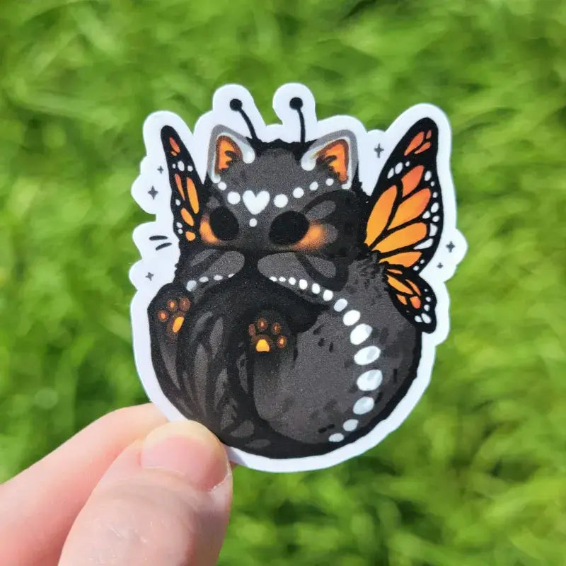 2.3" matte vinyl sticker featuring a sweet monarch butterfly kitty.
Matte laminated vinyl sticker
Waterproof, UV- and scratch-resistant
Features original, 100% hand-drawn art
Actual color may vary due to differences in lighting, device screen settings, etc.
