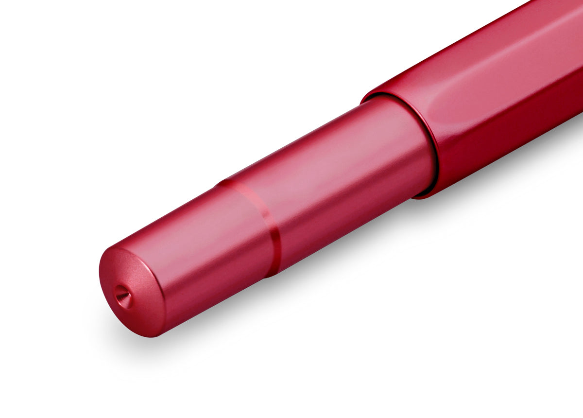 Just like the intricately cut facets of a ruby, the glossy polished surface of the fountain pen creates an exciting play of light on the octagonal shape. The refinement of the surface creates soft, rounded edges, which makes the writing instrument particularly comfortable to hold. A shadow engraving and the combination of aluminum with gold elements complements the elegant character of the pen. Included with this pen is a standard royal blue ink cartridge. 