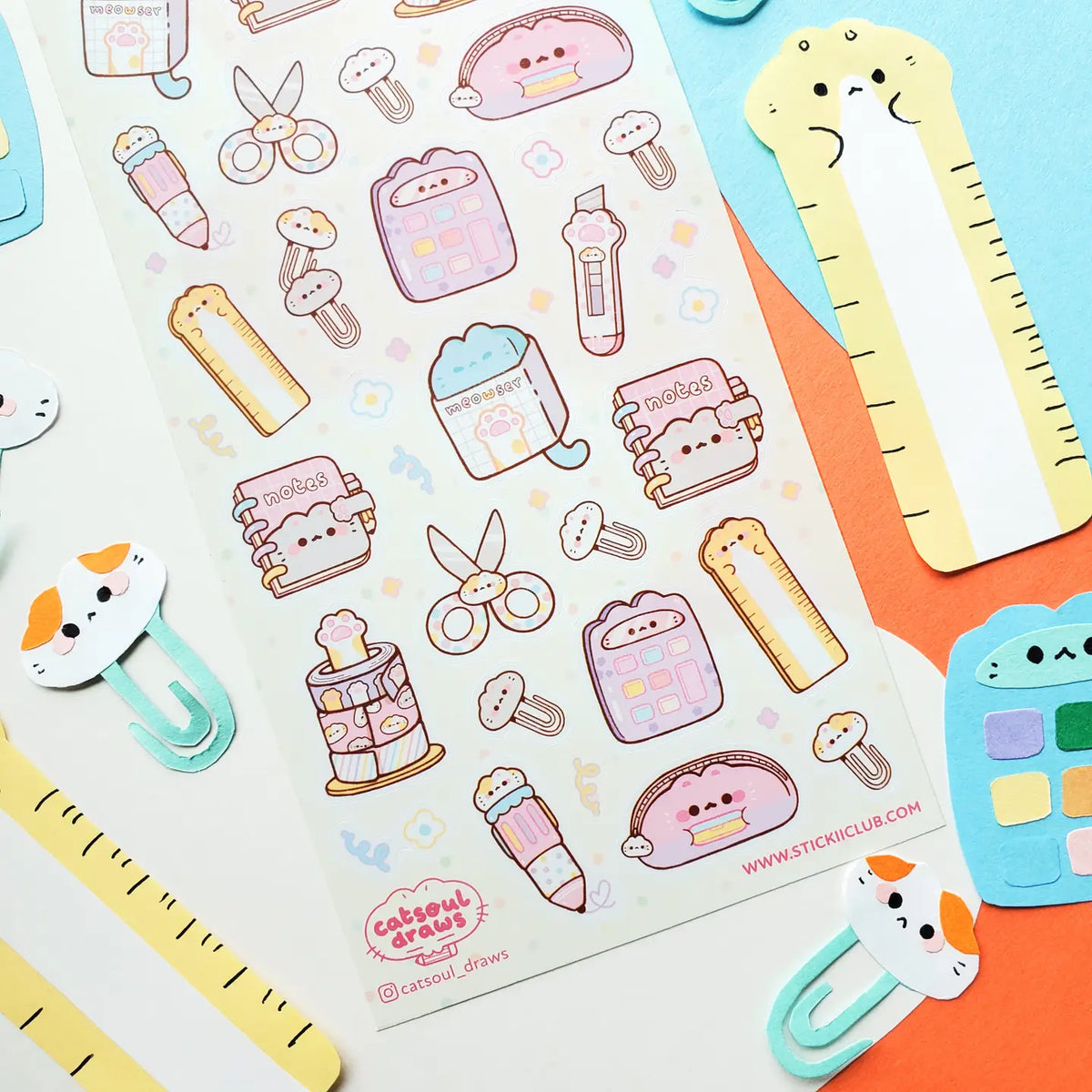 @catsoul_draws has put together the sweetest set of supplies, where even the stationery comes with whiskers and toe beans! From paw-print box cutters and cat-shaped rulers to notebooks, scissors, calculators, and washi tape, these kawaii supplies are here to make any workday a little more pawsitive.
Art by: @catsoul_draws
One sticker sheet is included.
Top Coating: None
Adhesive Layer: Paper
Backing Layer: Clear PET
Size: 6.69"x3.54"
Weight-0.03oz