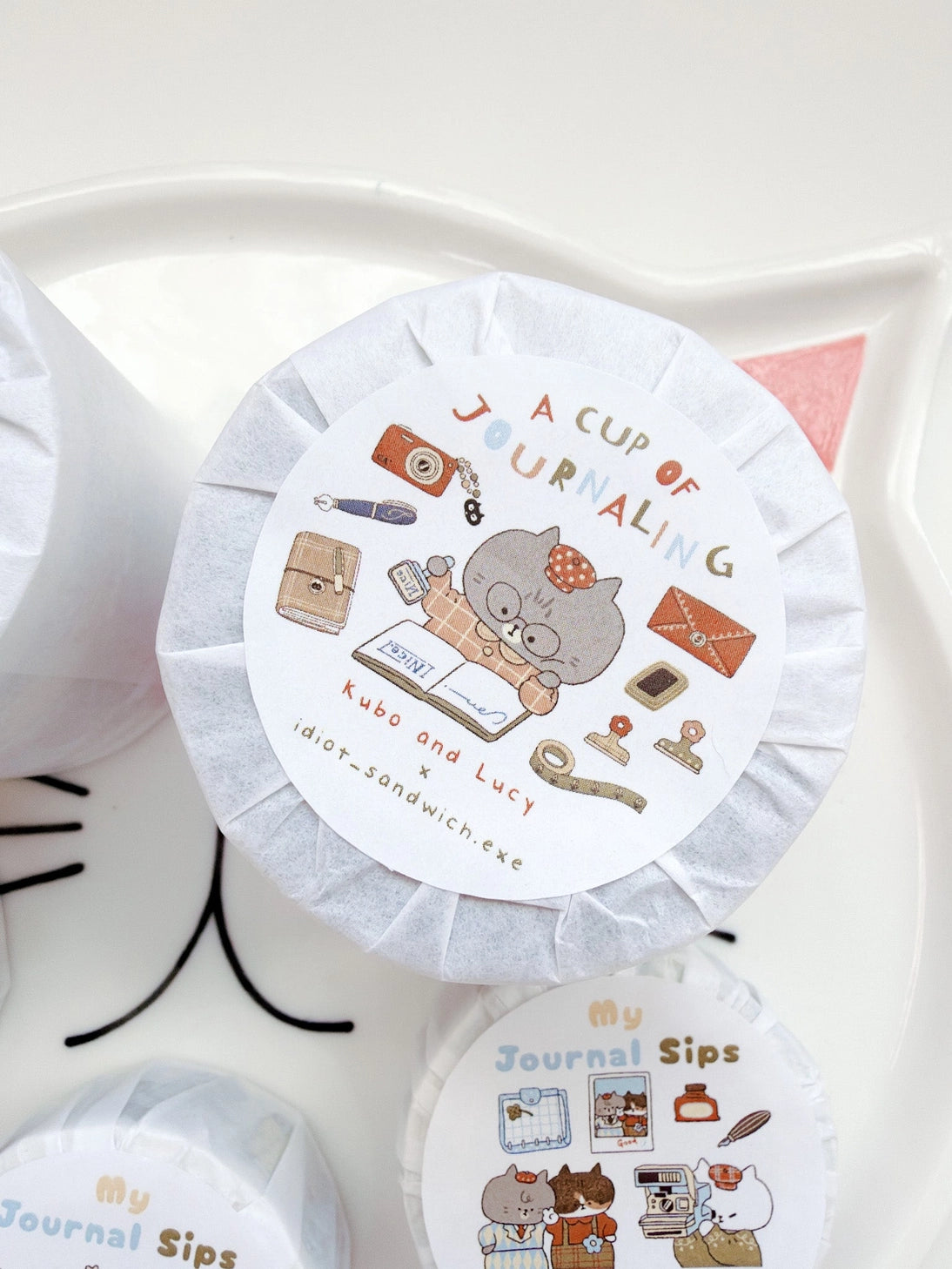 A Cup of Journaling P.E.T Tape, a collaboration with Idiot Sandwich
Add a touch of seasonal whimsy to your creative projects with Our first collaboration with Idiot Sandwich, an Illustrator from Vietnam. Thao illustrations captures everything Kubo and Lucy is about, coffee, stationery and journaling. This P.E.T tape is perfectly Kiss Cut, for easy use.