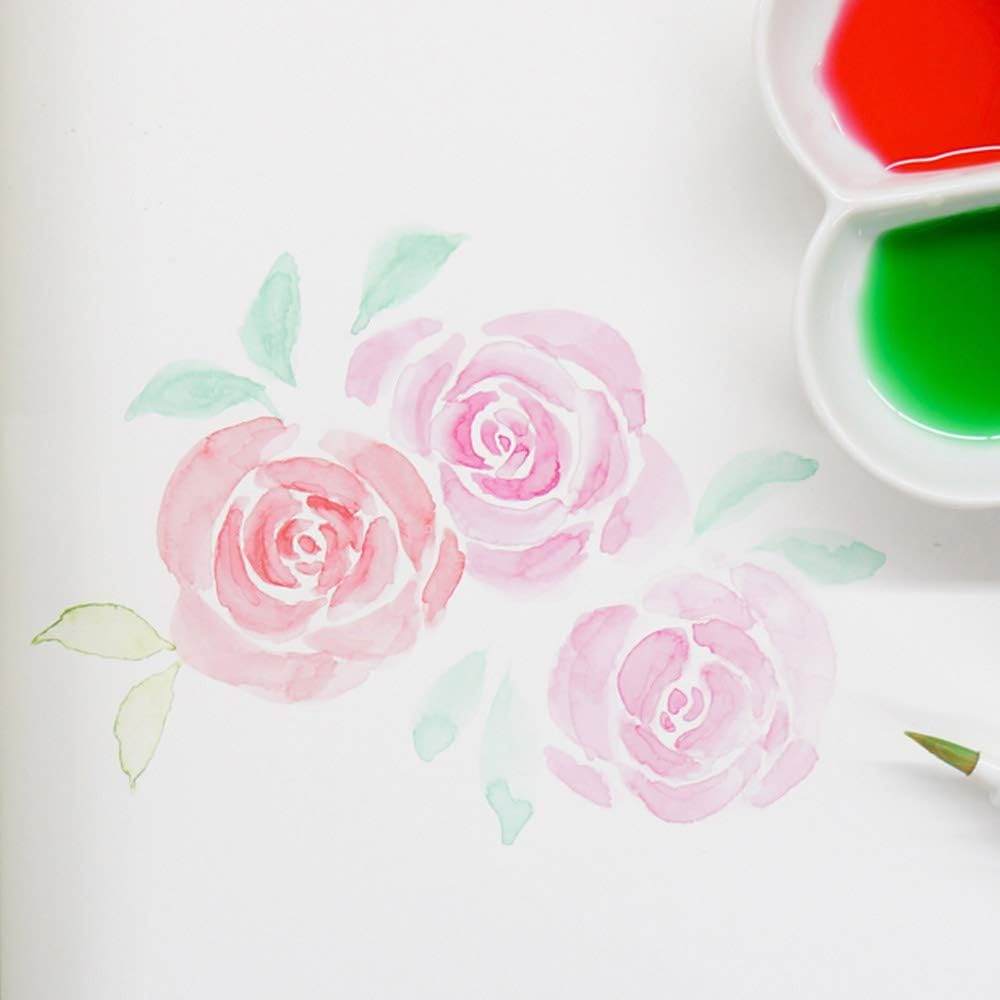 Take your artistic expression to the next level with the Zig Kuretake Gansai Tambi 18-Piece Watercolor Set.
These high-quality Japanese traditional solid watercolors offer stunning finishes, ideal for artists and crafters with a keen eye for detail. Their water-based pigments blend beautifully and create luminous effects, making them perfect for sketching, illustrating, and adding refined touches to mixed media projects.
This set contains White, Black, Cadmium Scarlet, Red, Rose Madder, Rose Madder