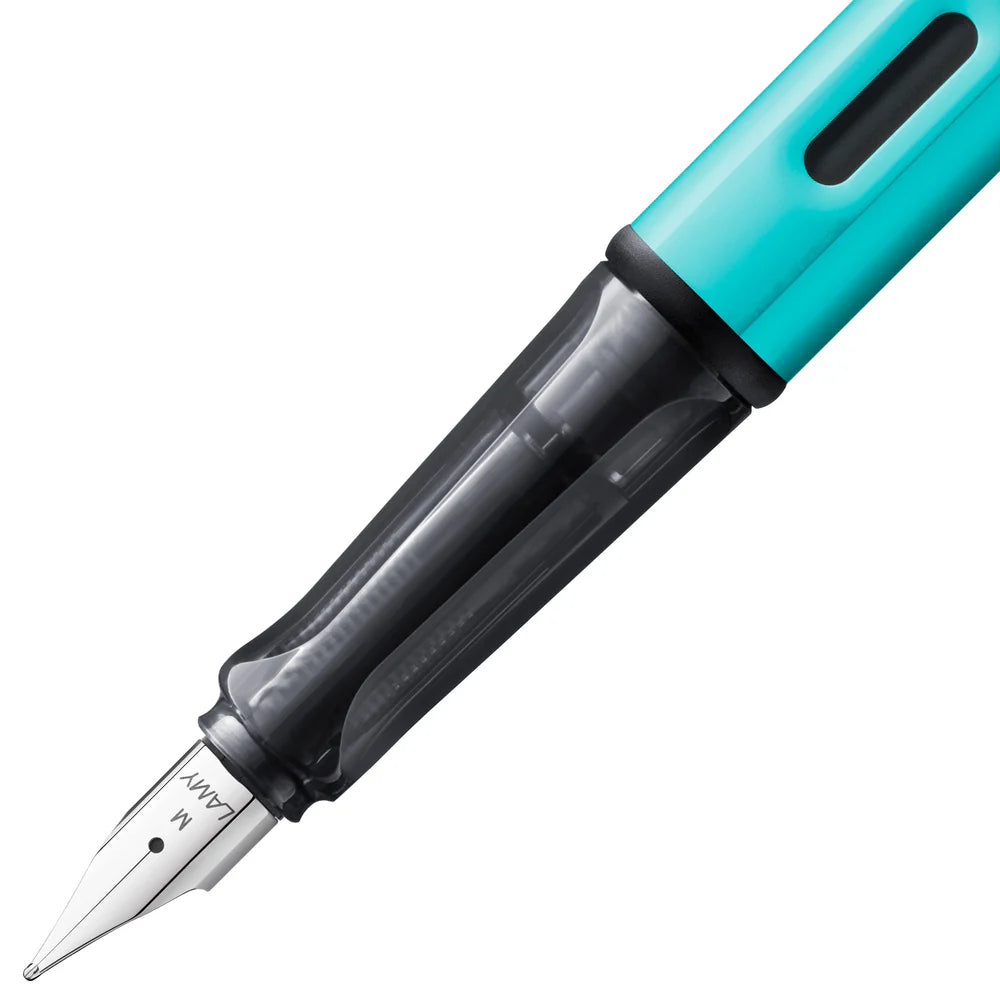 Light, lighter, LAMY AL-star: the writing classic made of resistant aluminium masters all challenges of everyday life in style. The transparent grip lies comfortably in the hand and, with an unobstructed view of the ink duct, turns the functional into a visual highlight. The series is ever inspiring with new special editions in current trendy colours and is thus an inspiring must-have in any pencil case.
Lightweight fountain pen with polished steel nib and ergonomic grip made of high-quality transparent pl