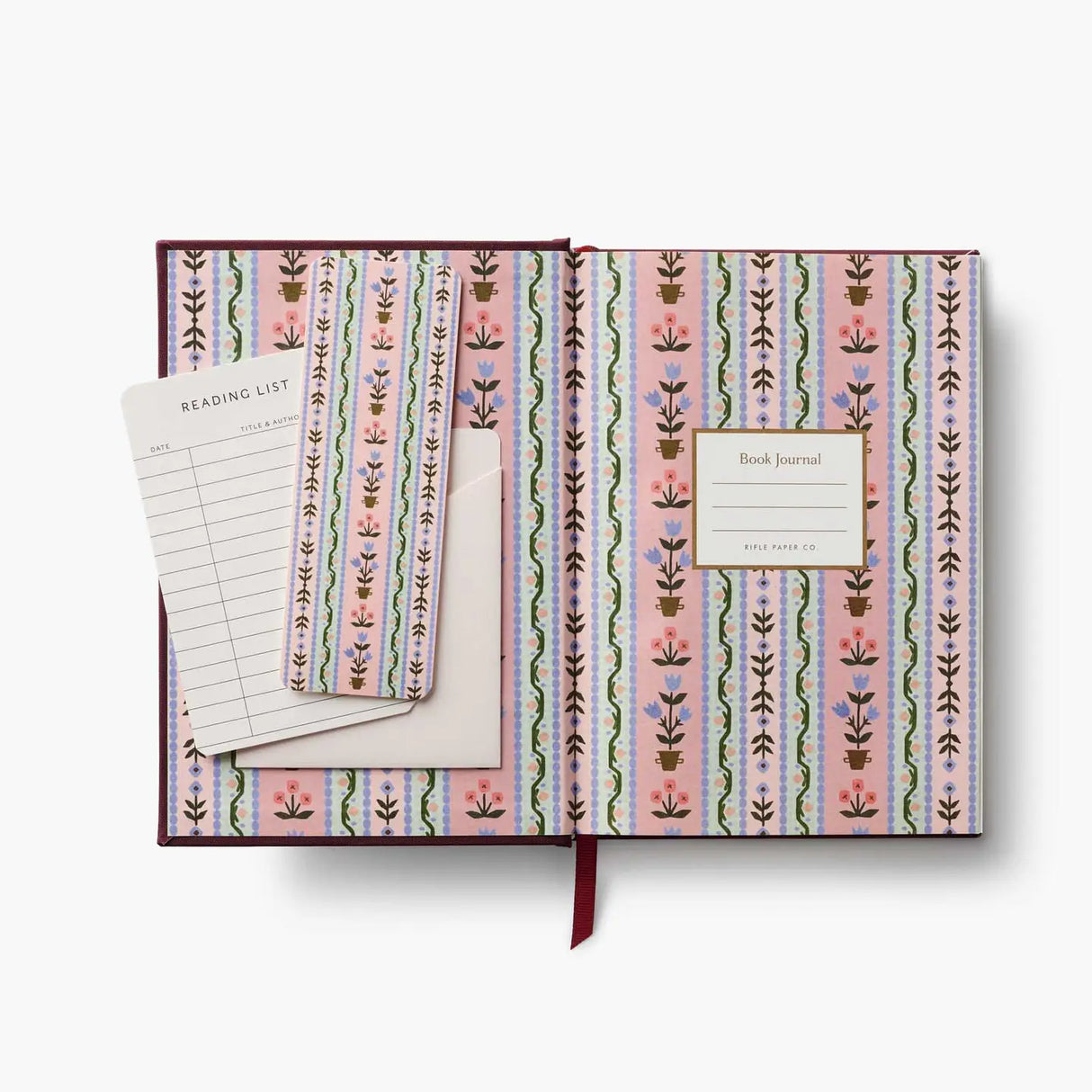 This embroidered-cover journal is designed with book lovers in mind. Perfect for logging reads and capturing reflections, the journal features useful sections for reading notes, review entries, books borrowed and lent, and a to-read list. Inside, you’ll also find a place-keeping ribbon and two paper bookmarks.
