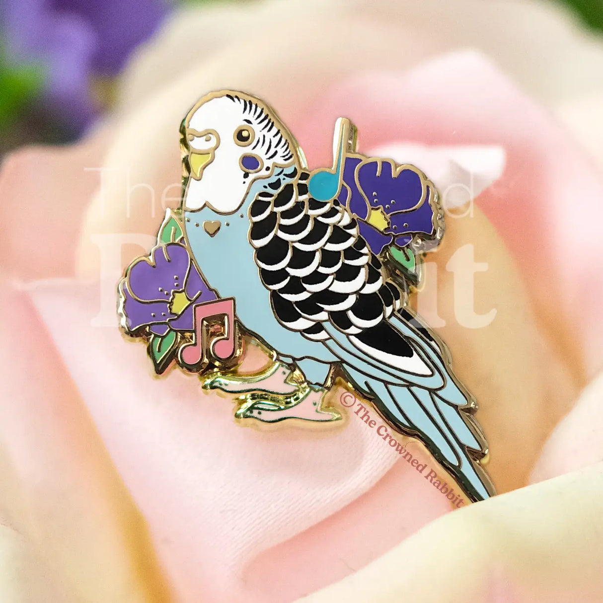 Sweet Parakeet pin for the bird and pet lover!
✦ Hard enamel
✦ Shiny gold metal
✦ 2 inches
✦ 2 Posts for extra security
✦ Rubber backings
✦ Back stamped for authenticity
Comes packaged on a backing card.