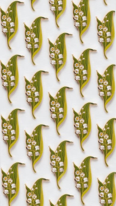 Pin de esmalte con forma de lirio de los valles