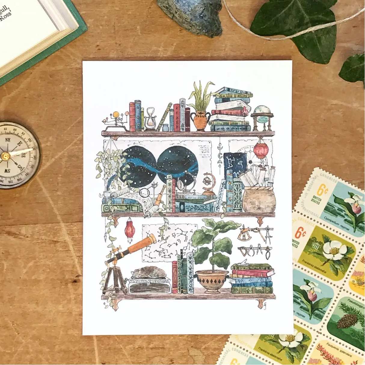 Postcard featuring my original watercolor and ink illustration of the oddities and books tucked away in the shelves of an inquisitive astronomer, including several star charts and a sleeping cat.
• Printed on high quality card stock
• Each postcard measures 4.25 x 5.5" (A2)