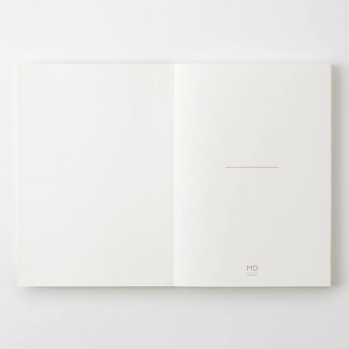Crafted in Japan, this minimalist notebook is designed to enhance your writing experience. Inside, you'll find the high-quality Midori Diary (MD) paper, first developed in 1960 and refined ever since. Midori has rigorously tested this paper with various writing instruments to ensure quality, checking for ink feathering or bleeding, drying time, the smoothness of pen tips on the surface, and the tactile feel. The result is a paper that resists bleeding and feathering and is fountain-pen friendly, ensuring a
