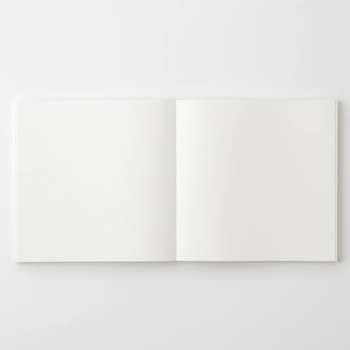 Crafted in Japan, this minimalist notebook is designed to enhance your writing experience. Inside, you'll find the high-quality Midori Diary (MD) paper, first developed in 1960 and refined ever since. Midori has rigorously tested this paper with various writing instruments to ensure quality, checking for ink feathering or bleeding, drying time, the smoothness of pen tips on the surface, and the tactile feel. The result is a paper that resists bleeding and feathering and is fountain-pen friendly, ensuring a