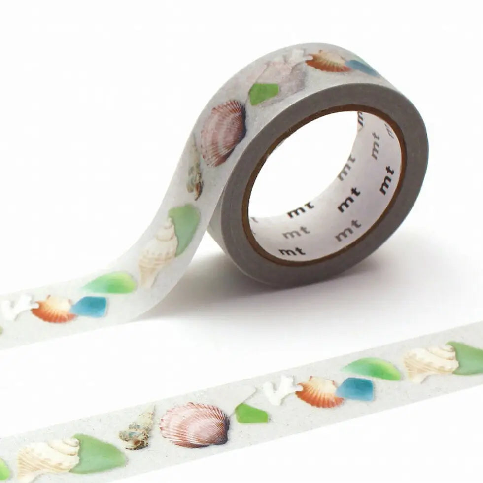 MT ex Washi Tape - Sea Glass and Shells
mt is the original washi masking tape, made in Japan by Kamoi Kakoshi. mt is colourful tape which is easy to tear by hand and reposition on nearly any surface. Write on it, layer it, and use it on paper, gifts, objects or the wall (mt won't damage paint - why not make a tape collage?) mt washi masking tape is now sold throughout the world in hundreds of colours and patterns.
Enjoy mt as a part of your daily life, adding a little colour everywhere.
All tapes are 15m