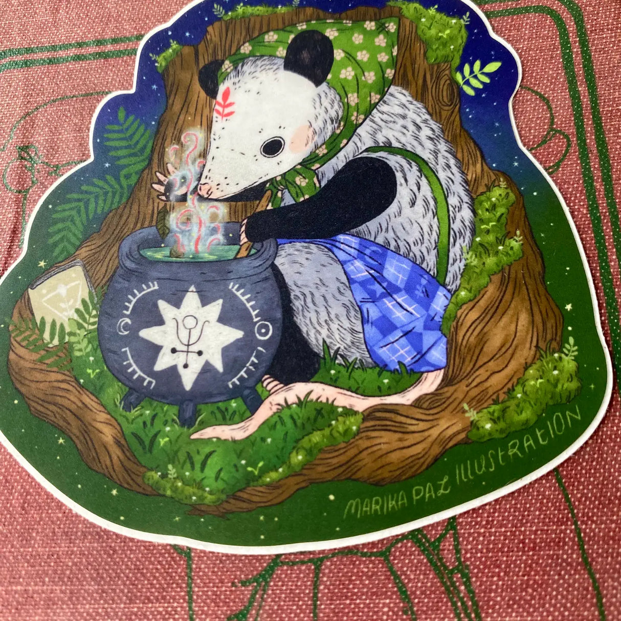A little possum is stirring up a brew under the stars! This vinyl matte sticker is weather and waterproof-stick it on a notebook, bike, or car- it's going to stick around! Heck, throw it on a water bottle and through the dishwasher. This sticker can go anywhere.
Sticker measures 4" x 4"
Printed in USA.
