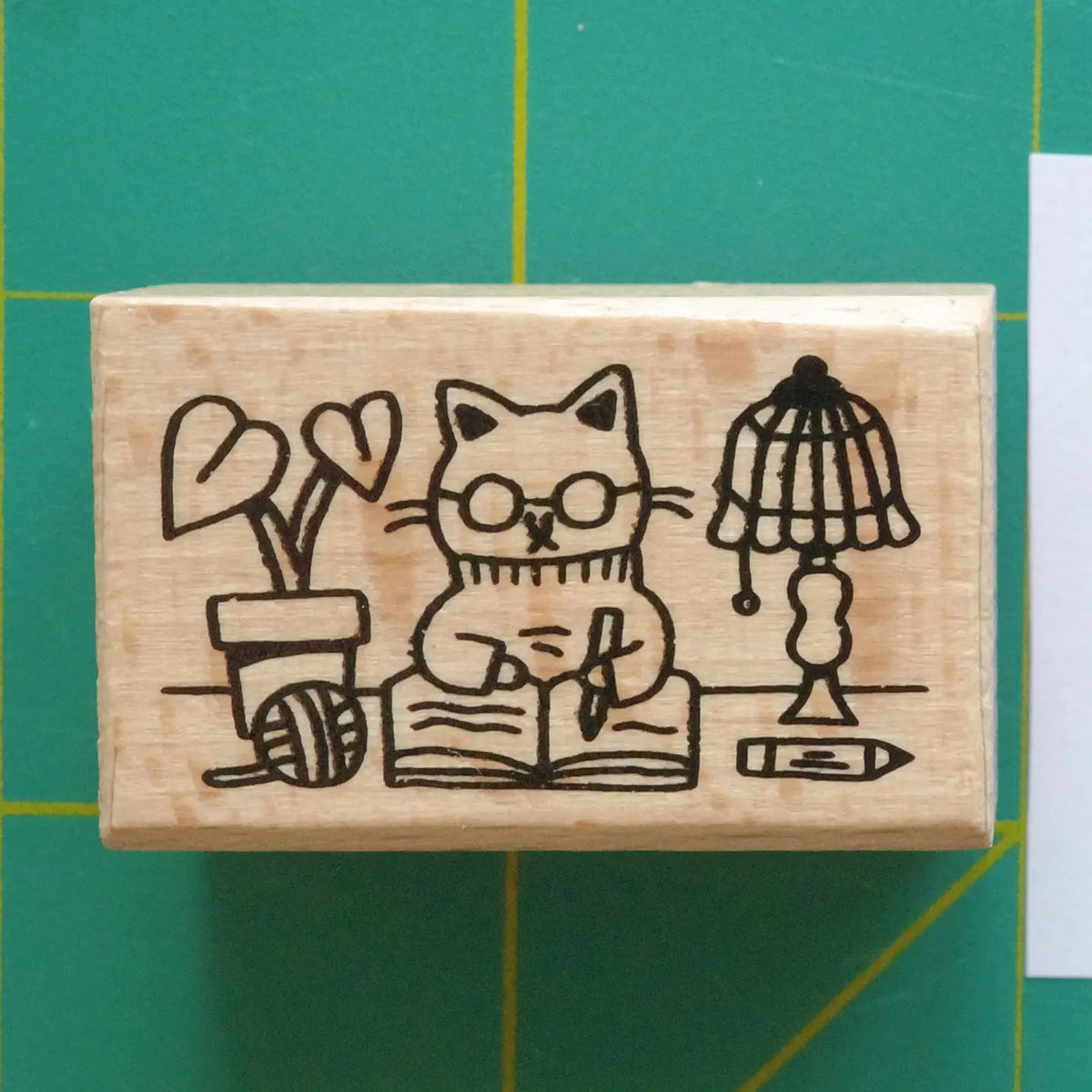 Megan Wang - Desk Cat Stamp
Decorate your planner or journal with this adorable stamp! This stamp is the perfect way to document your journaling days or spark creativity!
1.5 x 1 inch wooden rubber stamp