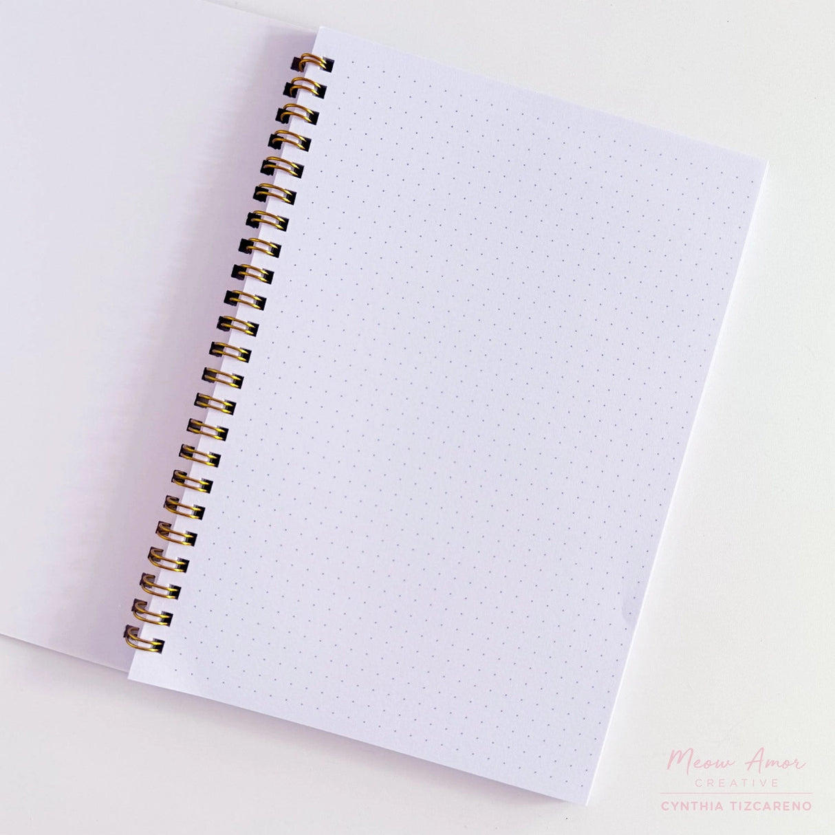Jot down your notes in the book cats spiral notebook. Featuring book cat design, it's the perfect companion for journaling, sketching, and creative thoughts.