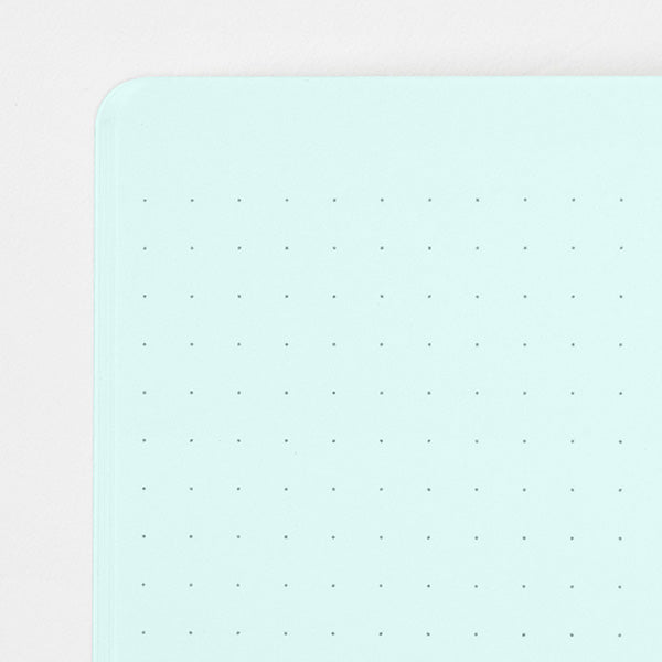 Stitcher-bound notebook for casual use. The inner paper is made of paper that matches the cover, so you can enjoy your favorite paper and pen color combination.
The popular 5mm dot graph inner paper is "MD paper" that is easy to write on regardless of pen. The dot grid serves as a subtle guide when writing letters and illustrations, and makes it easier to apply stickers and photos neatly.
A calm design that is easy for adults to hold. The dull color cover has a discreet foil stamping p