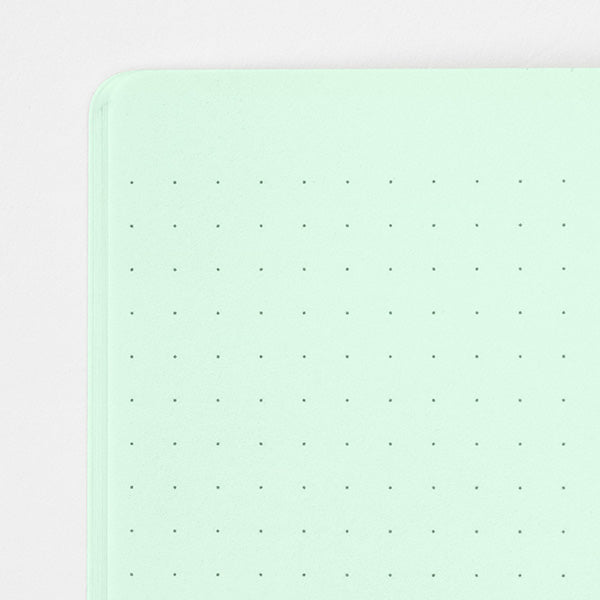 Stitcher-bound notebook for casual use. The inner paper is made of paper that matches the cover, so you can enjoy your favorite paper and pen color combination.
The popular 5mm dot graph inner paper is "MD paper" that is easy to write on regardless of pen. The dot grid serves as a subtle guide when writing letters and illustrations, and makes it easier to apply stickers and photos neatly.
A calm design that is easy for adults to hold. The dull color cover has a discreet foil stamping p