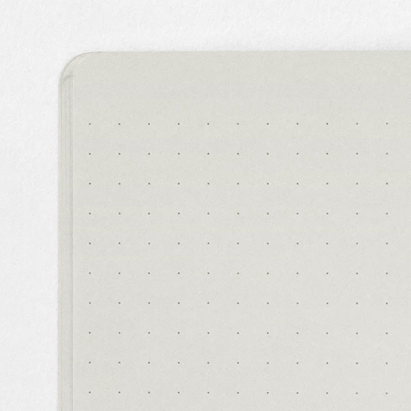 Stitcher-bound notebook for casual use. The inner paper is made of paper that matches the cover, so you can enjoy your favorite paper and pen color combination.
The popular 5mm dot graph inner paper is "MD paper" that is easy to write on regardless of pen. The dot grid serves as a subtle guide when writing letters and illustrations, and makes it easier to apply stickers and photos neatly.
A calm design that is easy for adults to hold. The dull color cover has a discreet foil stamping p