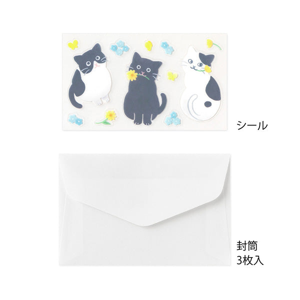 A refreshing stationery design featuring yellow and light blue flowers. On the writing side of the stationery, you can see a cat playing with butterflies in a flower garden.
Stickers adorned with cat gestures like holding flowers in its mouth or giving an upward glance are soothing
