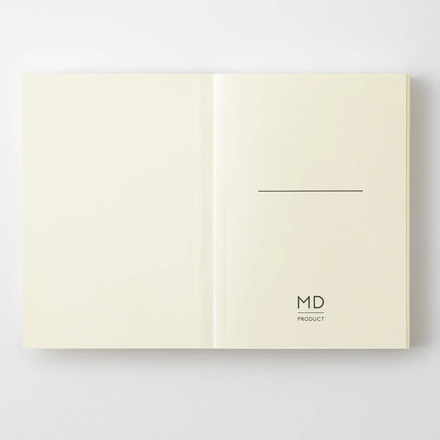 Crafted in Japan, this minimalist notebook is designed to enhance your writing experience. Inside, you'll find the high-quality Midori Diary (MD) paper, first developed in 1960 and refined ever since. Midori has rigorously tested this paper with various writing instruments to ensure quality, checking for ink feathering or bleeding, drying time, the smoothness of pen tips on the surface, and the tactile feel. The result is a paper that resists bleeding and feathering and is fountain-pen friendly, ensuring a