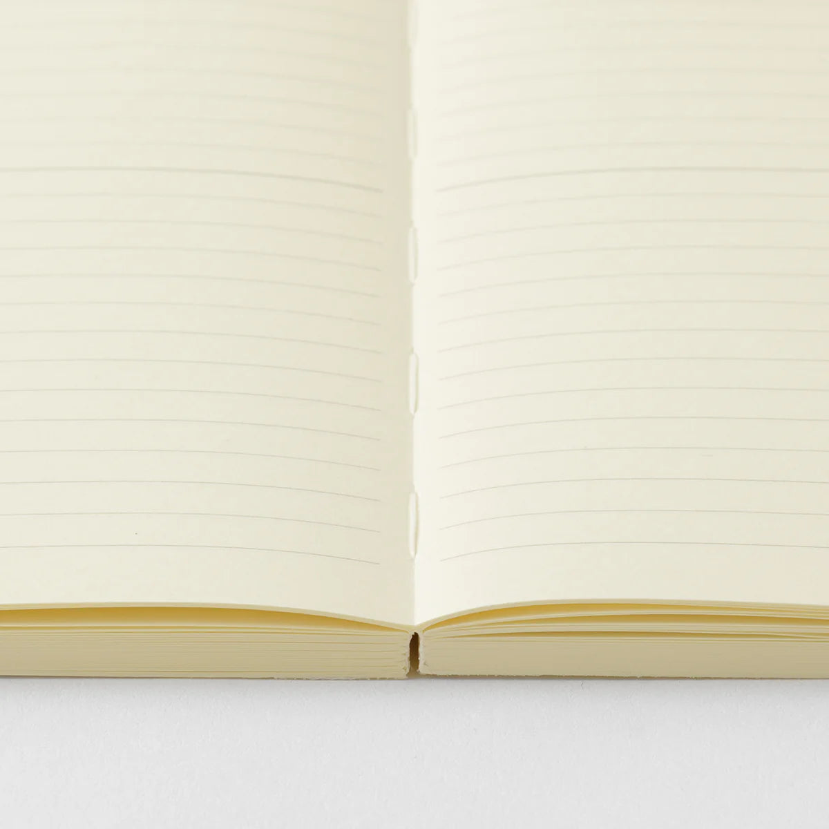 Crafted in Japan, this minimalist notebook is designed to enhance your writing experience. Inside, you'll find the high-quality Midori Diary (MD) paper, first developed in 1960 and refined ever since. Midori has rigorously tested this paper with various writing instruments to ensure quality, checking for ink feathering or bleeding, drying time, the smoothness of pen tips on the surface, and the tactile feel. The result is a paper that resists bleeding and feathering and is fountain-pen friendly, ensuring a