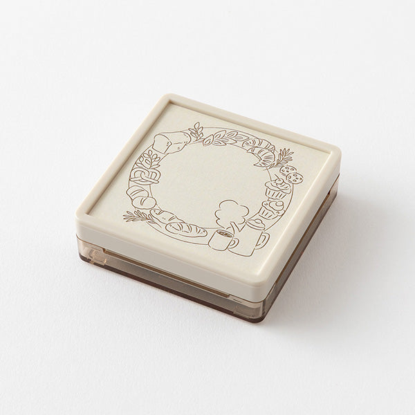 Add header and title to your notes with this cute pre-inked stamp! This is a brown ink (soft color type) that blends well with the colors and decorations of writing instruments. The stamp can be used on its own as a decoration or as a frame for titles and headers in a notebook. Pre-inked stamps are re-inkable using oil-based ink.
Stamp lightly for crisp impressions. Unlike the traditional rubber stamp where you need to press the stamp down and hold, pre-inked stamps work best with stamping lightly, do
