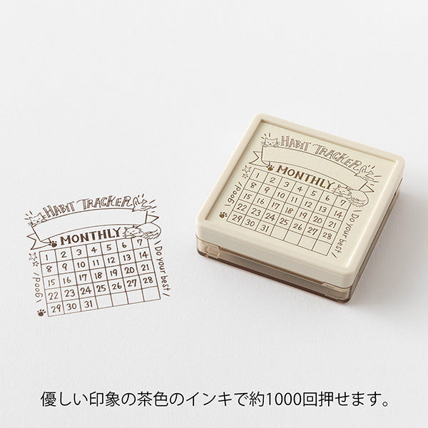 Midori Pre-inked Stamp Soft Color Habit Tracker Cat
Add header and title to your notes with this cute pre-inked stamp! This is a brown ink (soft color type) that blends well with the colors and decorations of writing instruments. The stamp can be used on its own as a decoration or as a frame for titles and headers in a notebook. Pre-inked stamps are re-inkable using oil-based ink.
Stamp lightly for crisp impressions. Unlike the traditional rubber stamp where you need to press the stamp down and hol