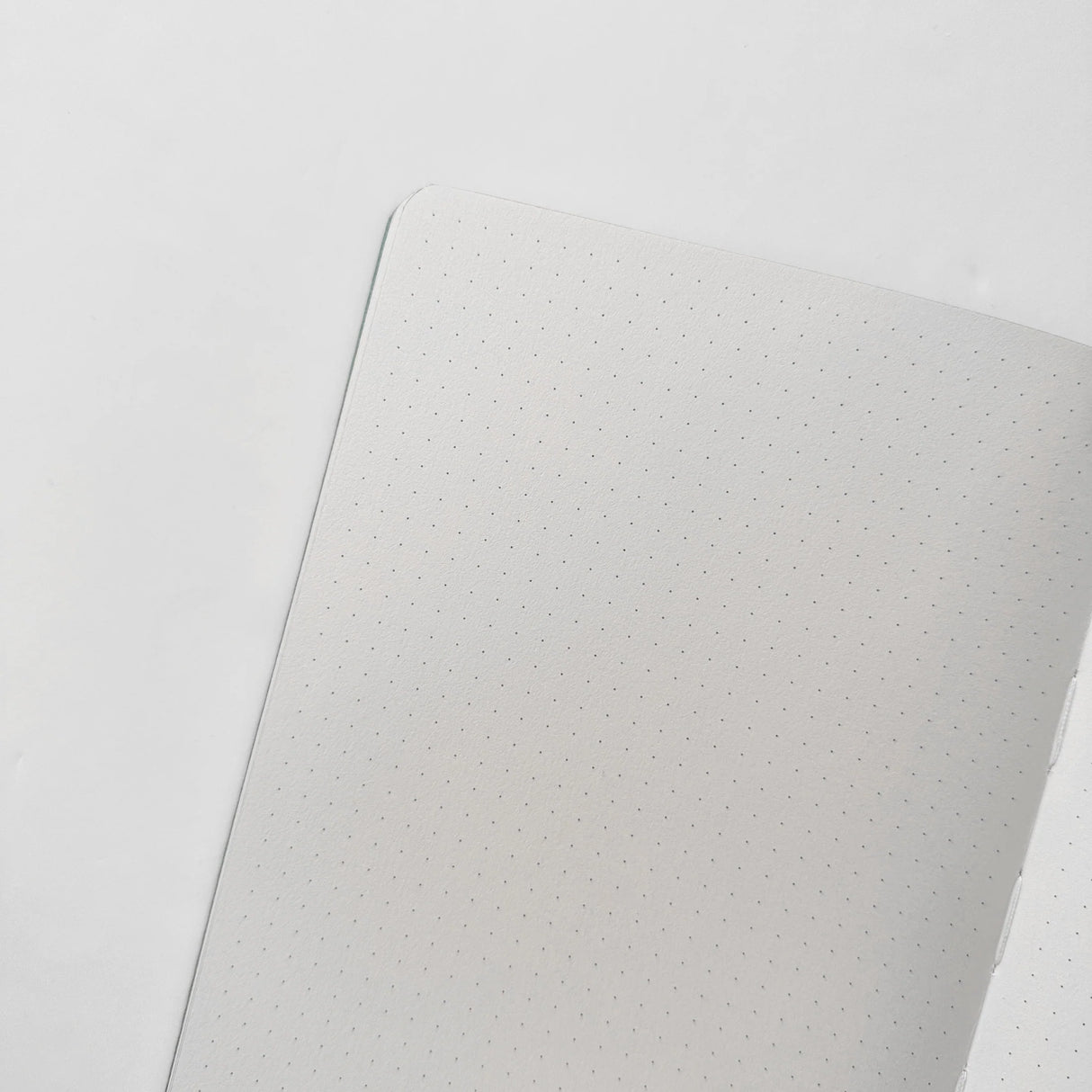Jiji The Cat Journal in Ocean Blue with Holographic Edges and Logo 🌊✨
Product Details:
Size: A5 (5.70 x 8.26 inches)
160 Dotted Grid Pages (5 x 5 mm)
2 Bookmarks
Elastic Band and Pen Holder
Expandable storage compartment