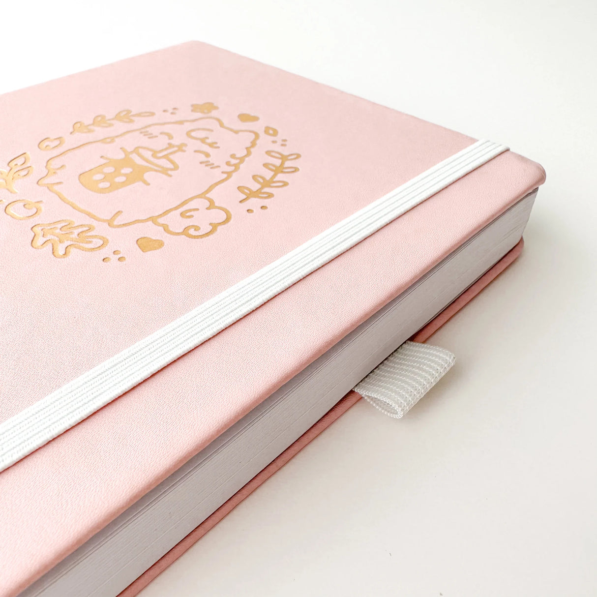 Soft pastel vegan leather bullet journal with delicate gold foil details, made to make your everyday planning feel a little more special ✨
Product Details:
Size: A5 (5.70 x 8.26 inches)
160 Dotted Grid Pages (5 x 5 mm)
2 Bookmarks
Elastic Band and Pen Holder
Expandable storage compartment